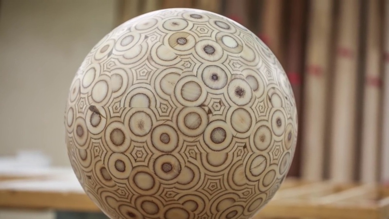 Guy makes a big ball out of